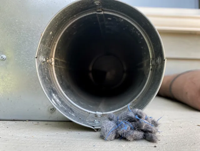 Ladera Ranch Dryer Vent Cleaning technician using specialized equipment to clear severe dryer vent blockage in Ladera Ranch